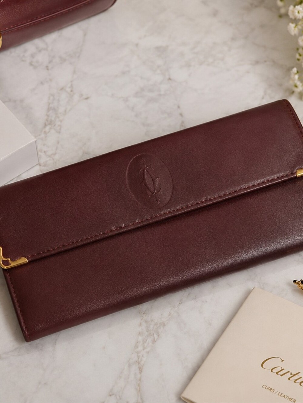 Cartier Burgundy Leather Continental Wallet with Gold Corners